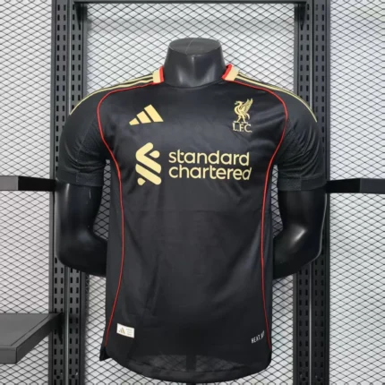 Introducing the Liverpool Third Player Jersey 25/26, a bold statement in both design and performance. Crafted for die-hard Reds fans and inspired by the club’s fearless energy on away turf, this jersey combines vibrant modern aesthetics with cutting-edge sportswear technology. Engineered with breathable, sweat-wicking fabric, it ensures maximum comfort during intense play or while cheering from the stands. The official player version offers an athletic fit, lightweight construction, and heat-applied club crest and sponsor logos—exactly like those worn by your favorite stars on matchday. This Liverpool FC 2025/26 third kit is more than just a jersey; it’s a piece of the legacy. Perfect for collectors and active fans alike, it’s a must-have for showcasing your pride in style. Whether you're playing or watching, let your passion shine through with the latest Liverpool jersey. Liverpool Third Player Jersey 25/26