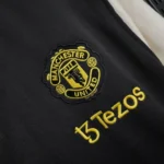 Buy Manchester United Black & White Windbreaker 2025-26 - Image 2
